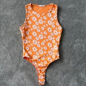 Orange and White Floral Bodysuit